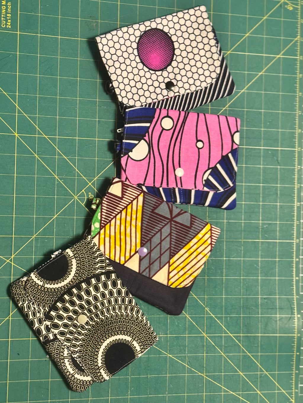 Ankara snap travel wallet – pink and blue wavy stripe print with cream snap