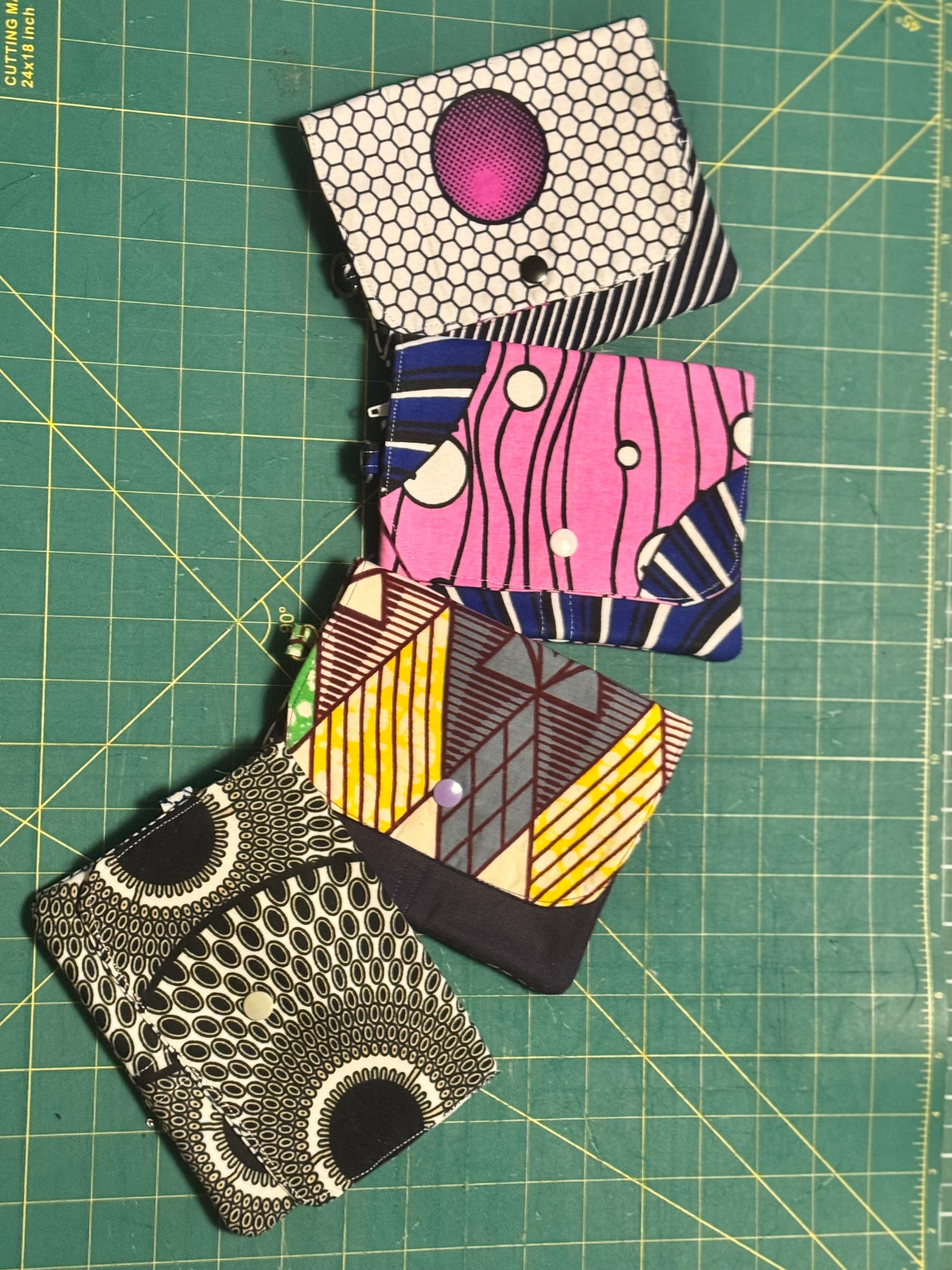 Ankara snap travel wallet – pink and blue wavy stripe print with cream snap