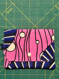 Ankara snap travel wallet – geometric yellow and gray print with purple snap