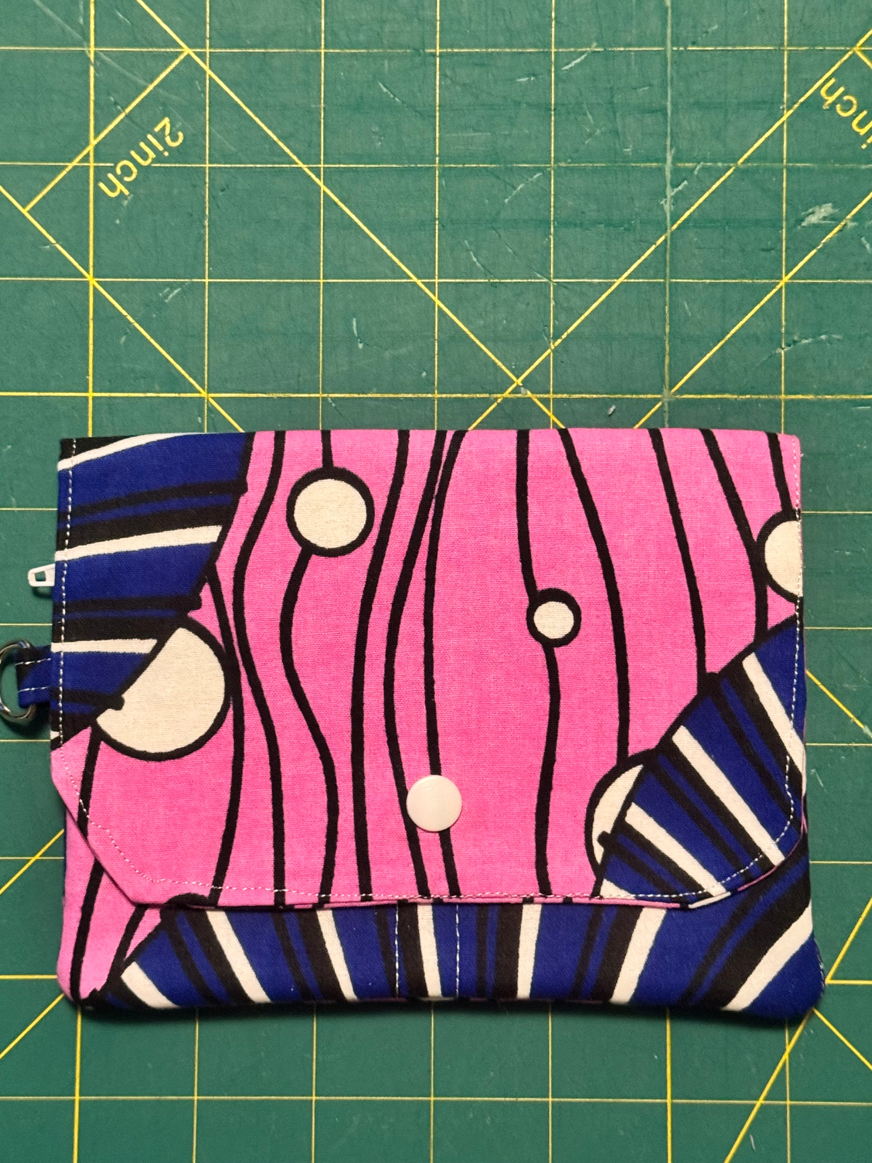 Ankara snap travel wallet – geometric yellow and gray print with purple snap